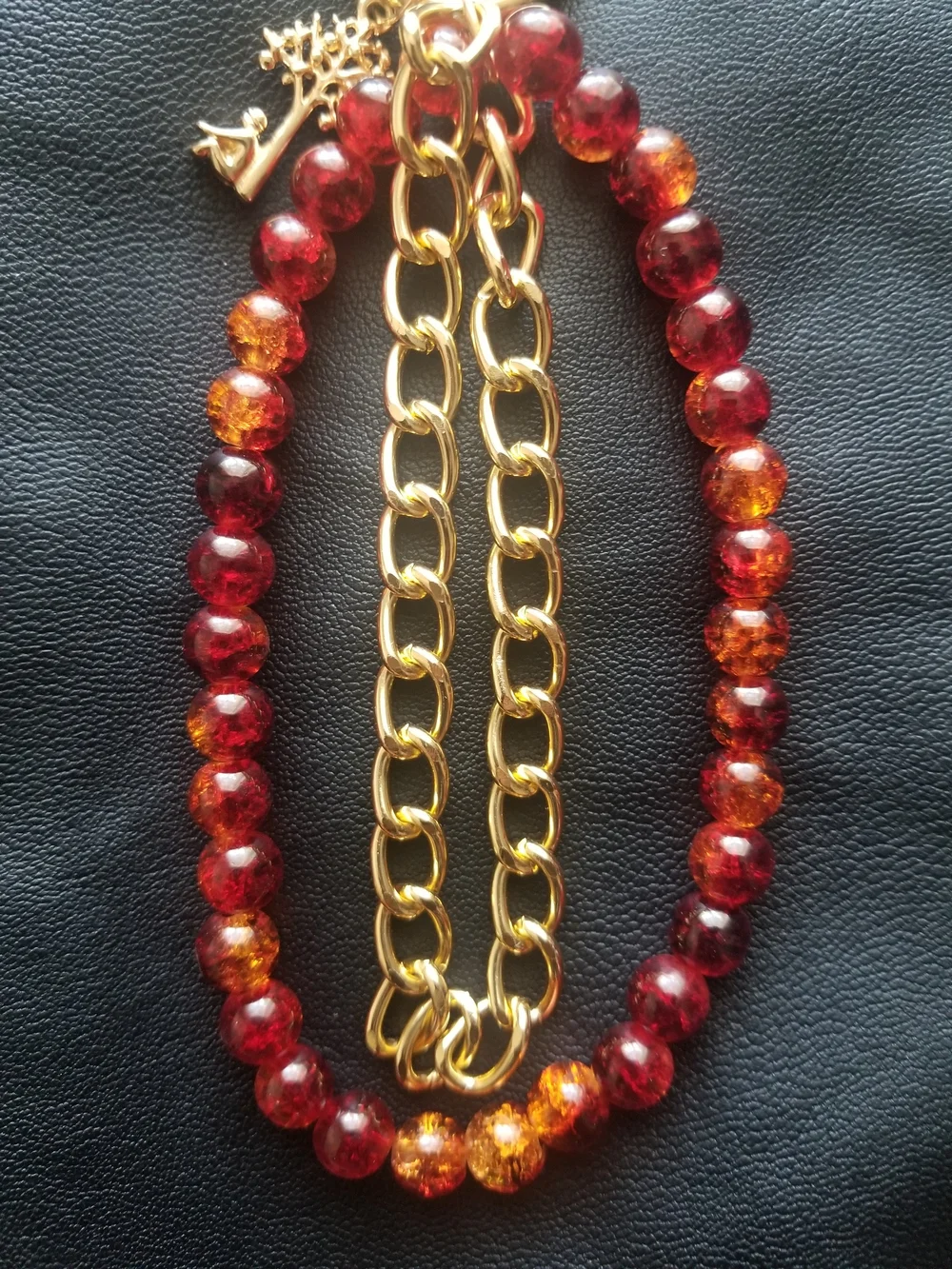 Gold Chain Bracelet Phone Charm with Red and Amber Faceted Beads